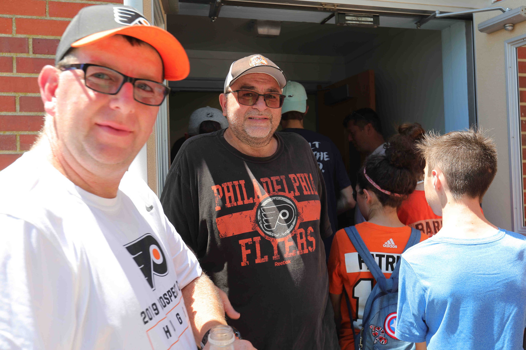 Philadelphia Flyers prospects sign autographs and play volleyball